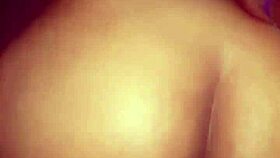 mature ebony couple bent over in a wild frenzy with big cock.