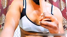 Young girl bent over in cage getting doggystyle with strapon and toys on big clit