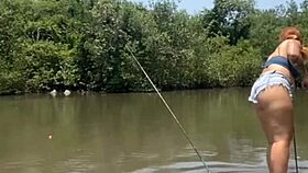 fishing in short shorts in the usa with exhibitionist flashing.