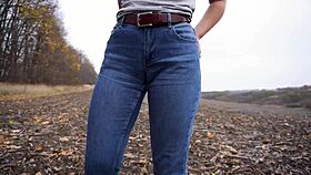 Milf Teases Her Big Cameltoe in Blue Jeans Outdoors