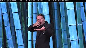 Naked weather girl undresses publicly, teasing with ripped clothes.