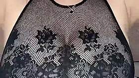 She fucks those huge natural tits in stockings on the mesh!