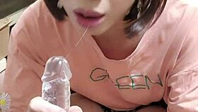 Shemale Ting Xuan performs blowjob on dildo