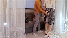 this stunning redhead housewife is having passionate sex. she's riding in her skirt.