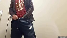 Muscular stud indulges in solo fun in public restroom