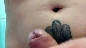 teen jerks off to big cock in bath, imagining facial and cumshot orgasm.