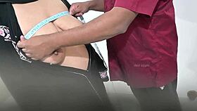 Tailor Measures Hijab Lady