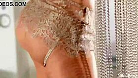 nikki benz performs a striptease on stage