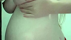 pregnant milf in lingerie gets natural tits massage