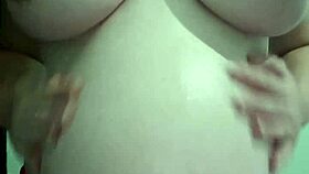 pregnant milf in lingerie gets natural tits massage