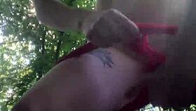 woman pees through bikini pants outdoors in public