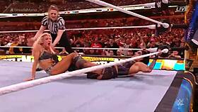 rhea ripley faces charlotte flair in the smackdown women's championship at wrestlemania 39