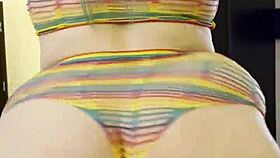 Rainbow clad joan day plays with herself and shakes big ass