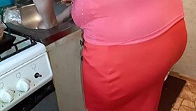 I jerk off to my neighbor in the kitchen while she is preparing dinner.