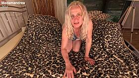 In dominatrix outfit, feeling intense pleasure with mega dildo anal