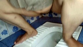 Indian Nepali bhabhi's bathroom peeing video goes viral in public compilation.