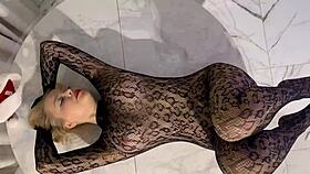 Slut sucks Santa Claus under Christmas tree, gets cum in pussy