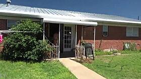 Delicious redhead in lingerie poses