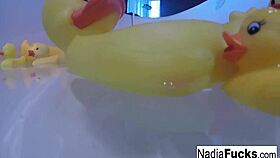 sexy nadia says, 'i'm taking a bath with rubber duckies'