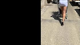 Aunt Lilly walks in heels outdoors.