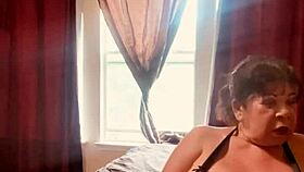 woman enjoys solo relaxation with big tits