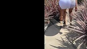 Aunt Lilly walks in heels outdoors.