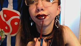 Young goth details lipstick and nipple play
