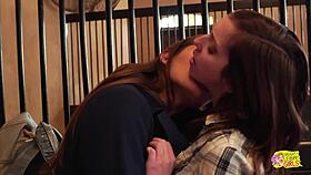 in the stable by the horses they were kissing and later their cunts got exposed