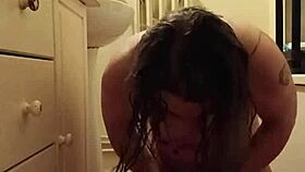 sexy slave in chains enjoys self-pleasure and orgasm