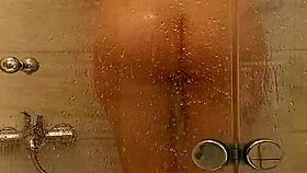 She caresses herself in the bath 😊