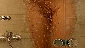 She caresses herself in the bath 😊