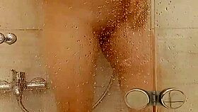 She caresses herself in the bath 😊