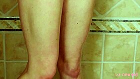 gorgeous blonde enjoys relaxing shower