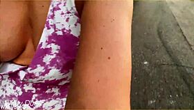 wife casually shows off her big tit cleavage in public during an outdoor dare