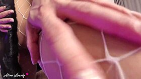 Hot Brunette In Fur Coat And Fishnet Pantyhose Masturbates Pussy Intensely