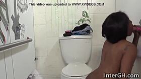 Brie Simone interacts in glory hole setting