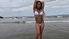 On the beach, a black beauty with a big clit endures gaping anal, assfucking, and creampie from interracial fucking, fingering, and orgasmic release.