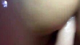 A slut masturbates in her car with a dildo