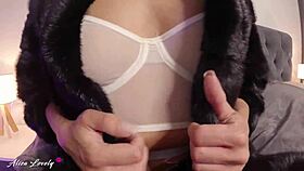 Hot Brunette In Fur Coat And Fishnet Pantyhose Masturbates Pussy Intensely