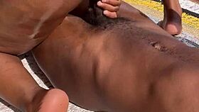 Hey, watch this hairy pussy African couple fucking outdoor. They get a big black cock cumshot in doggystyle.