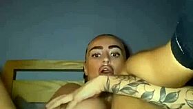 tattooed goth slut fingers herself raw