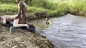 outdoor sex by the river with two hot girls sucking and cumming 😍