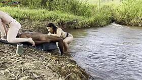 outdoor sex by the river with two hot girls sucking and cumming 😍