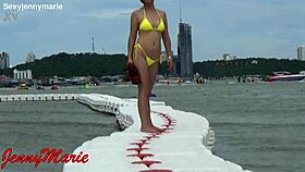 jenny marie shows off her new yellow bikini outdoors