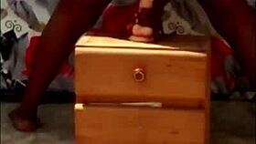 African woman fucks herself outside