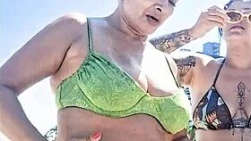 Me and my slutty friend getting wild on the beach for everyone to see 😏🌊