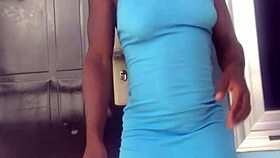 A crazy woman twerks wildly on the balcony under the open sky