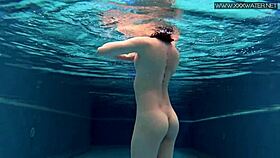 cute shy czech teen swims in pool with shorts