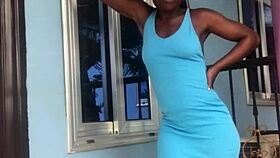 A crazy woman twerks wildly on the balcony under the open sky