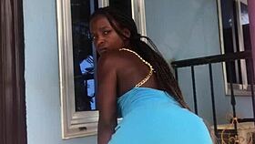 A crazy woman twerks wildly on the balcony under the open sky